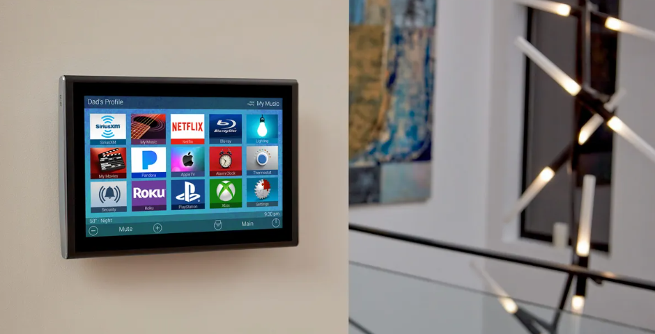 Wall-mounted smart home touchscreen with lighting and comfort controls.png